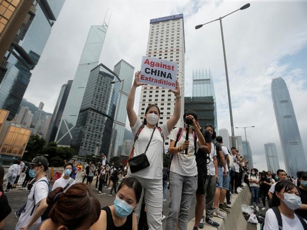 UPDATE 5-Tension runs high as Hong Kong protesters smash windows ahead of handover rally