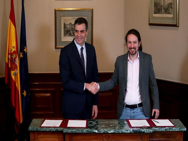 Spain's ruling Socialists sign coalition deal with Podemos  