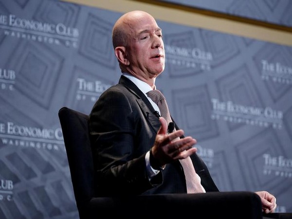 Bezos and Biden spar over corporate taxes and inflation
