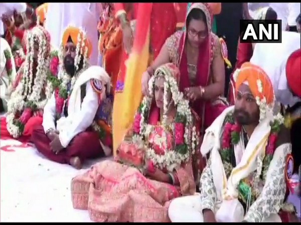 Couples in traditional gears married in mass marriage ceremony in Telangana