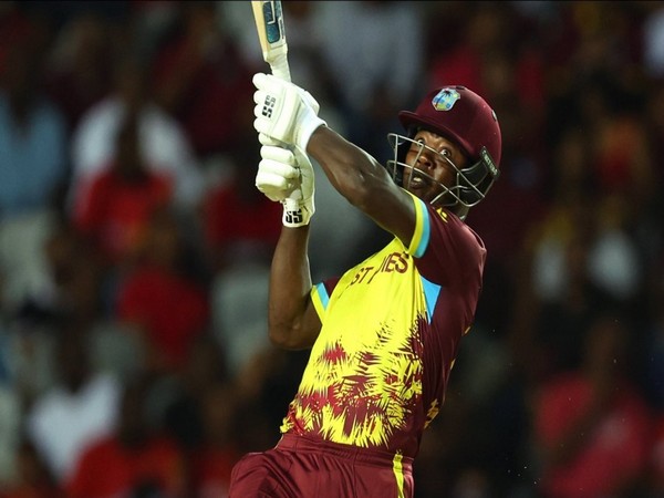 Sherfane Rutherford Guides West Indies to T20 World Cup Super Eight with Stellar Performance