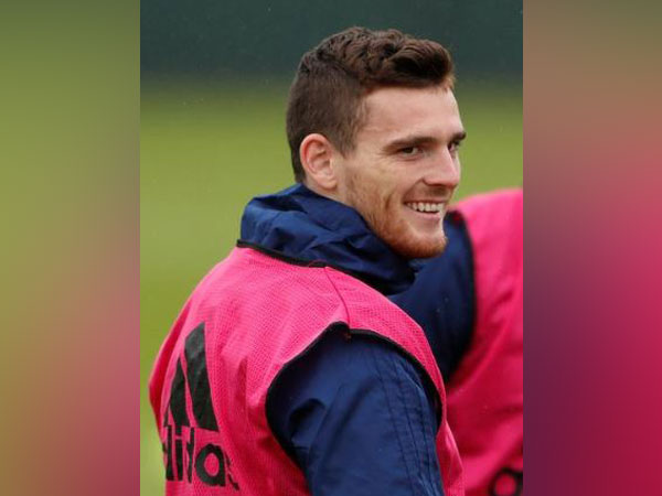 Andy Robertson to travel to US despite hand infection