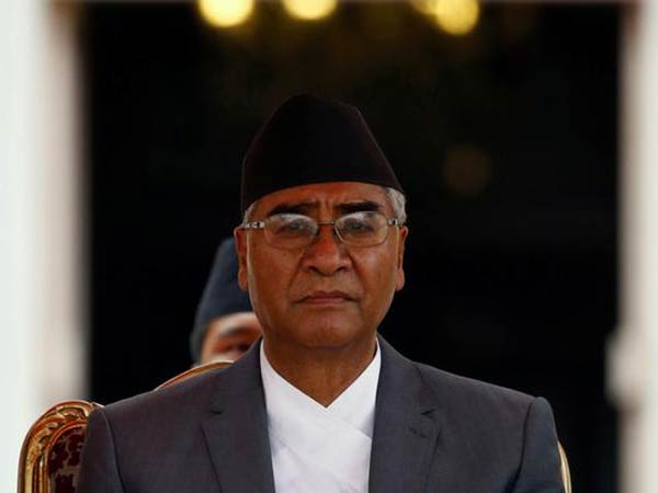 Nepal PM ousts four ministers from cabinet ahead of November polls