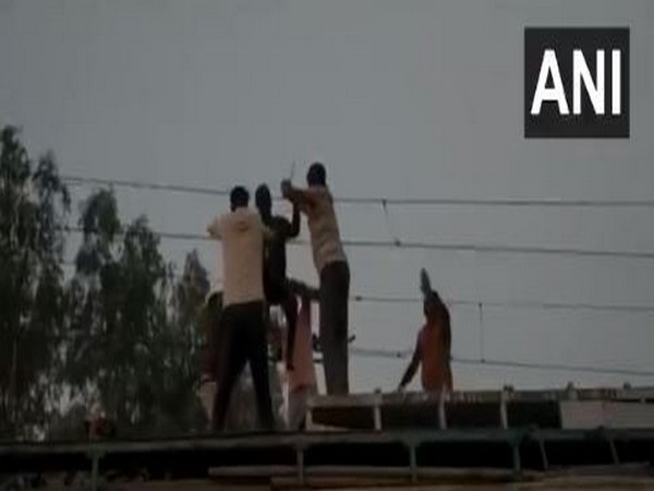 Madhya Pradesh: Man dangling from an overhead wire on tracks rescued 