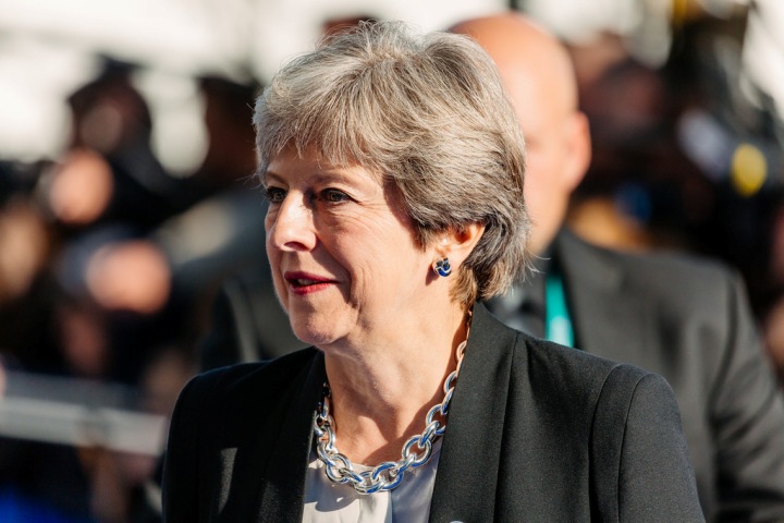 British PM "crushed", "humiliated" after huge rejection of her Brexit deal