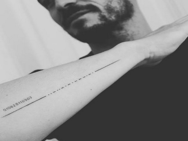 Orlando Bloom misspells son's name in new morse code tattoo