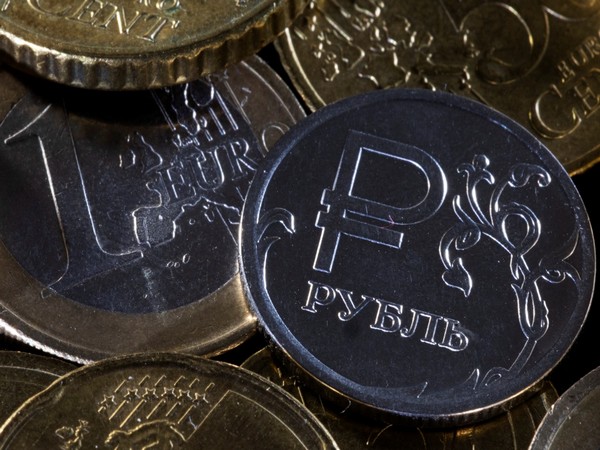 Russian rouble firms towards 62 vs dollar as oil pressure lingers