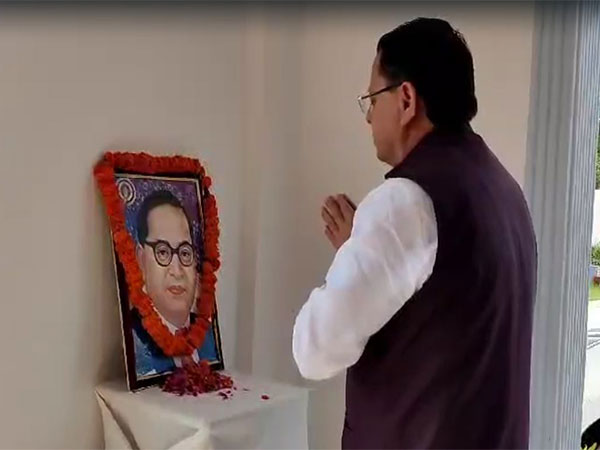 Uttarakhand CM Pushkar Singh Dhami pays floral tributes to BR Ambedkar on his birth anniversary 