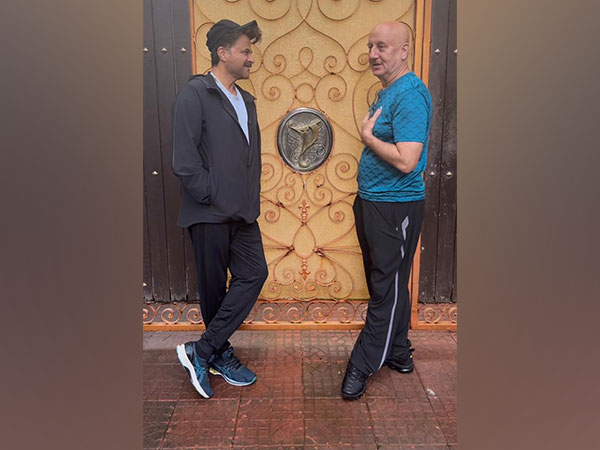 Anupam Kher, Anil Kapoor revisit old memories as they pose outside Yash Chopra's residence