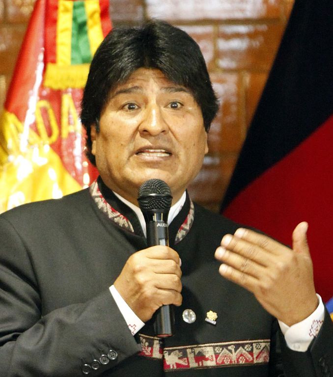 UPDATE 4-Bolivian protesters flood capital as Morales whisker away from outright victory