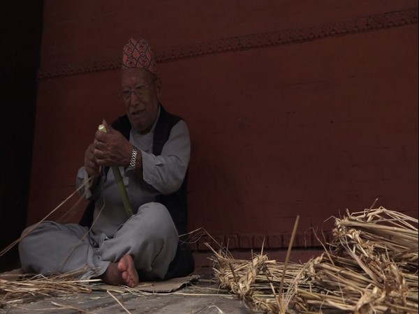 Wearing metal rings and dragging demon deity through the town, Nepal welcomes season of festivities