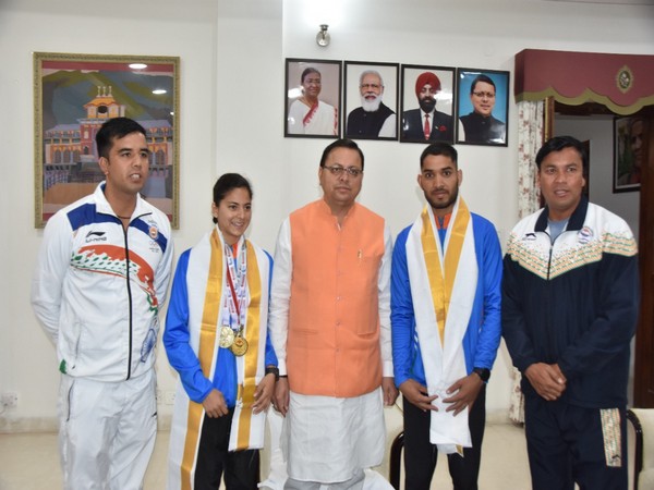 Uttarakhand: CM Dhami awards Rs 1 lakh to athletes Mansi Negi and Suraj Panwar
