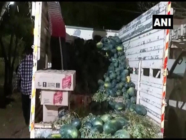 Illegal liquor bottles seized from watermelon-laden trucks in Andhra's Guntur