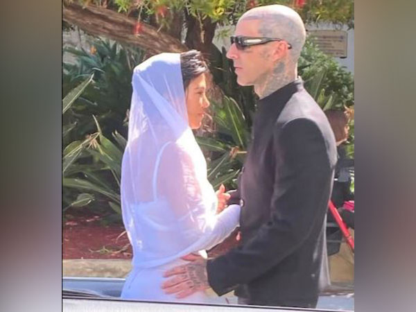 Kourtney Kardashian and Travis Barker are "legally married" in Santa Barbara