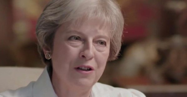 Challenging her critics, British PM May embraces Brexit "opportunity" (UPDATE 2)