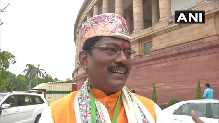 BJP MP Ashok Kumar Yadav arrives in Parliament wearing traditional Madhubani stole, cap