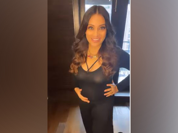 Look I've got a baby in my belly: Bipasha shows her baby bump in new video