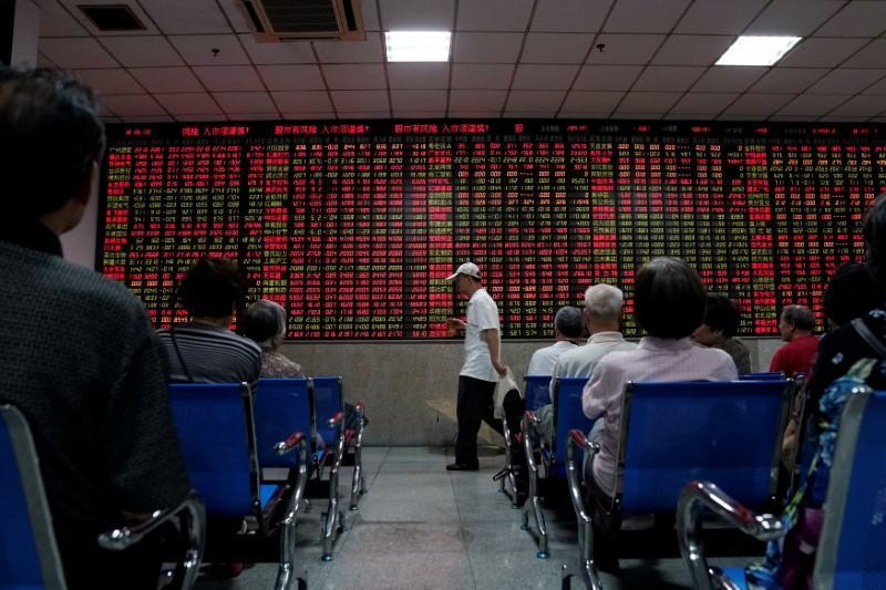 Asian shares stumble in holiday thin trade on Monday as China cancels trade talk