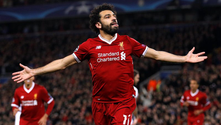 UPDATE 1-Soccer-Salah back on the scoresheet as Liverpool scrape past Huddersfield