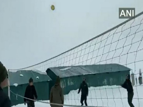 ITBP personnel play volleyball at 14,000 feet in Sikkim amid snow conditions