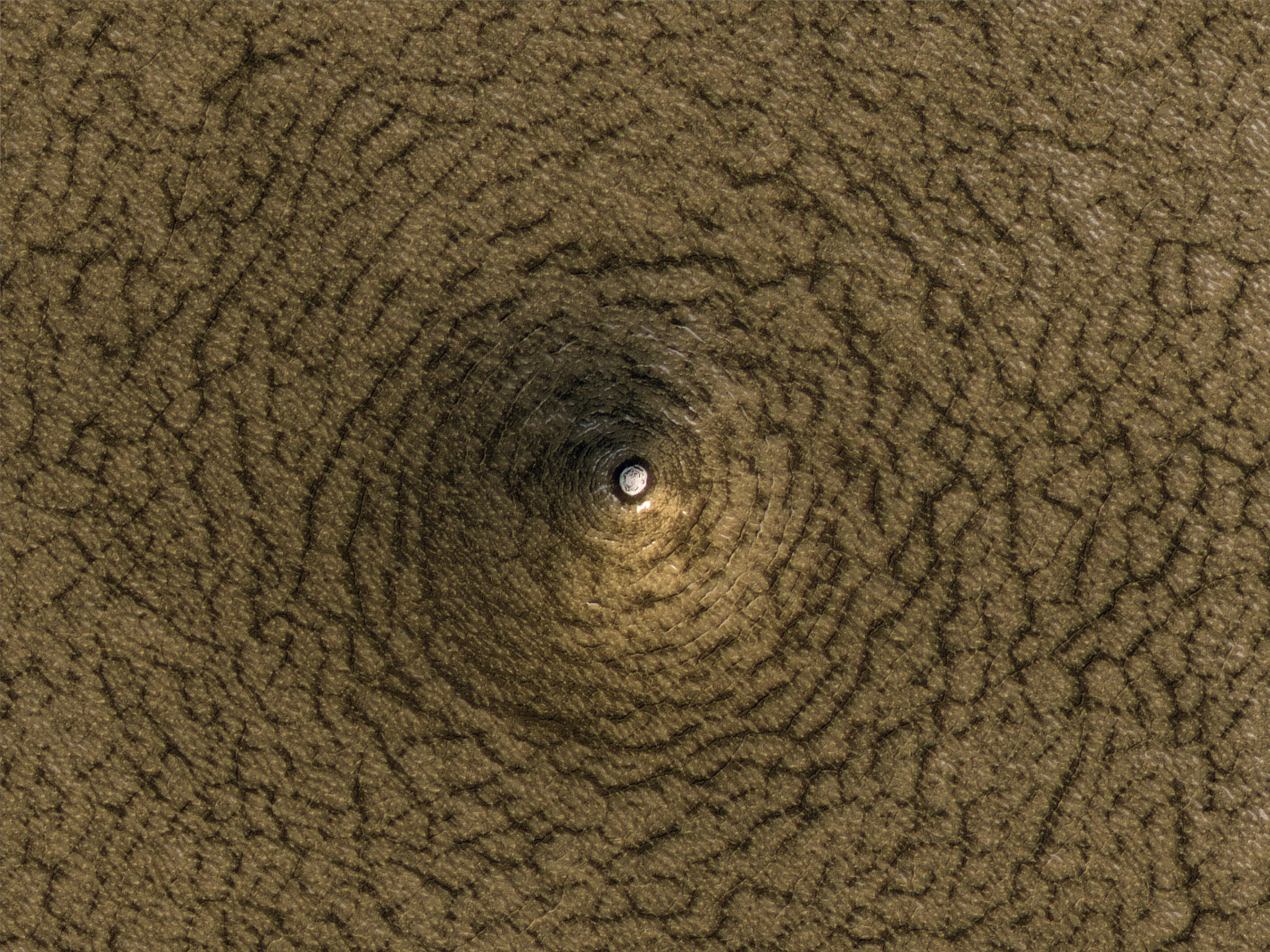 NASA's HiRISE camera captures this strange pit on Mars | See pic