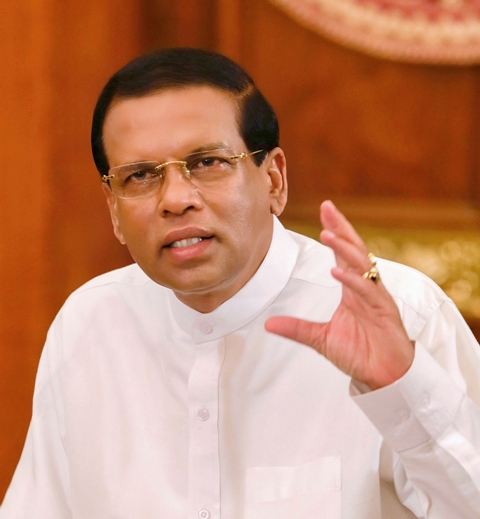 Sri Lankan Constitution's opens mouth on Prez Sirisena exercising power to sack PM