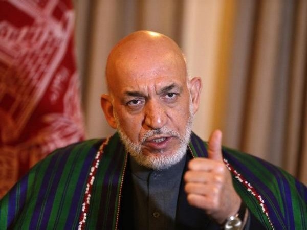 Hamid Karzai meets Iran's special envoy for Afghanistan Qomi, discusses Iran-Afghan situation