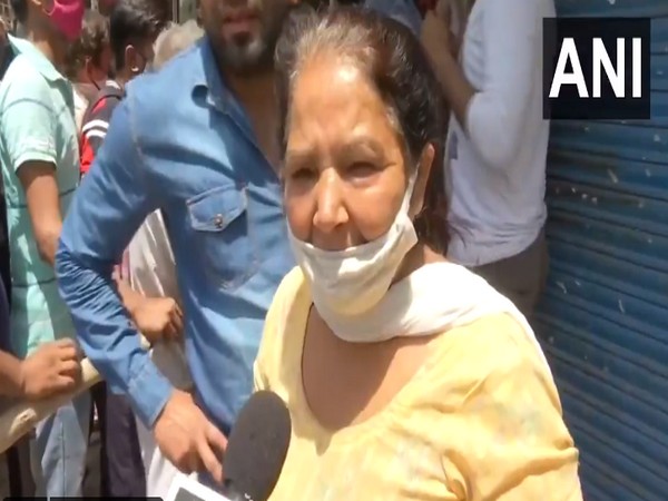 Delhi lockdown: Injection will not work in COVID, a peg will, says a woman boozer