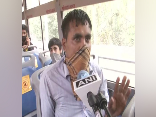 Migrant workers reach Anand Vihar in hope of getting bus for their hometown