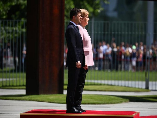 Angela Merkel sparks health concerns as she trembles during ceremony