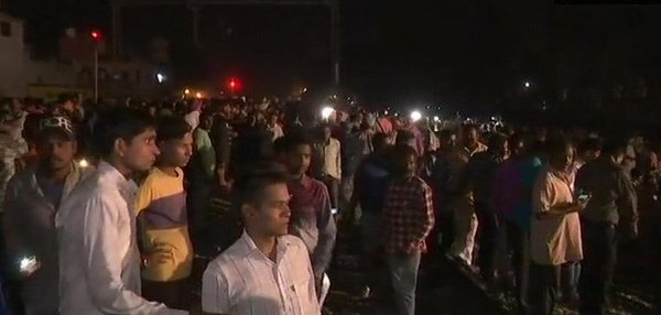 UPDATE 1-Train runs over crowd on tracks in northern India, 50 feared dead