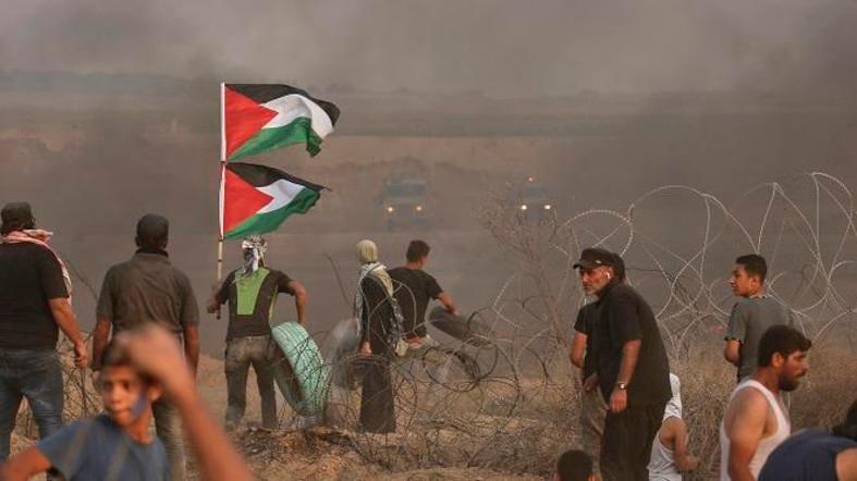 Israeli soldiers shoot many Palestinians protesting near Gaza border