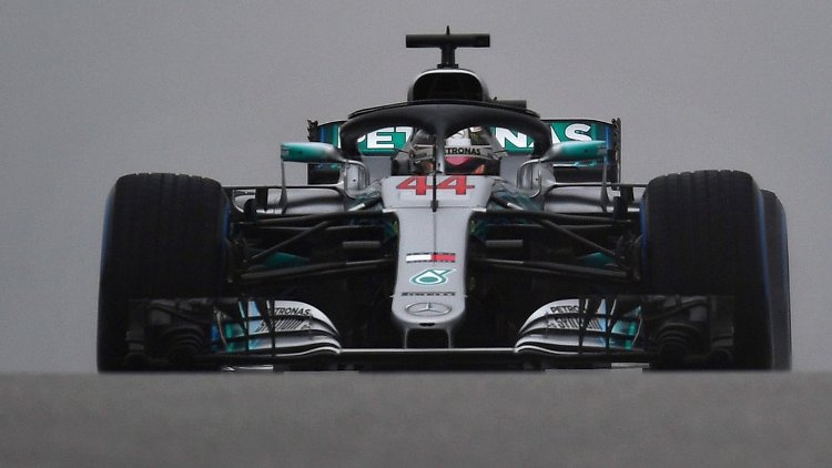 U.S. Grand Prix: Lewis Hamilton leads Mercedes one-two in wet FP1