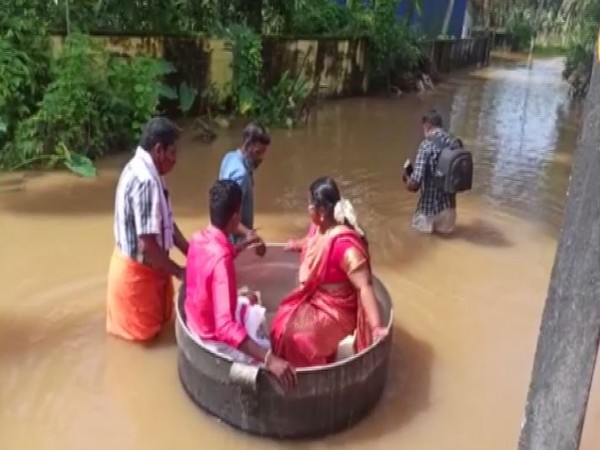 Kerala rains: Bride, groom reach temple in cooking vessel for marriage