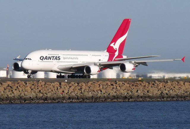 Australia's Qantas to provide in-flight masks but will not leave seats vacant