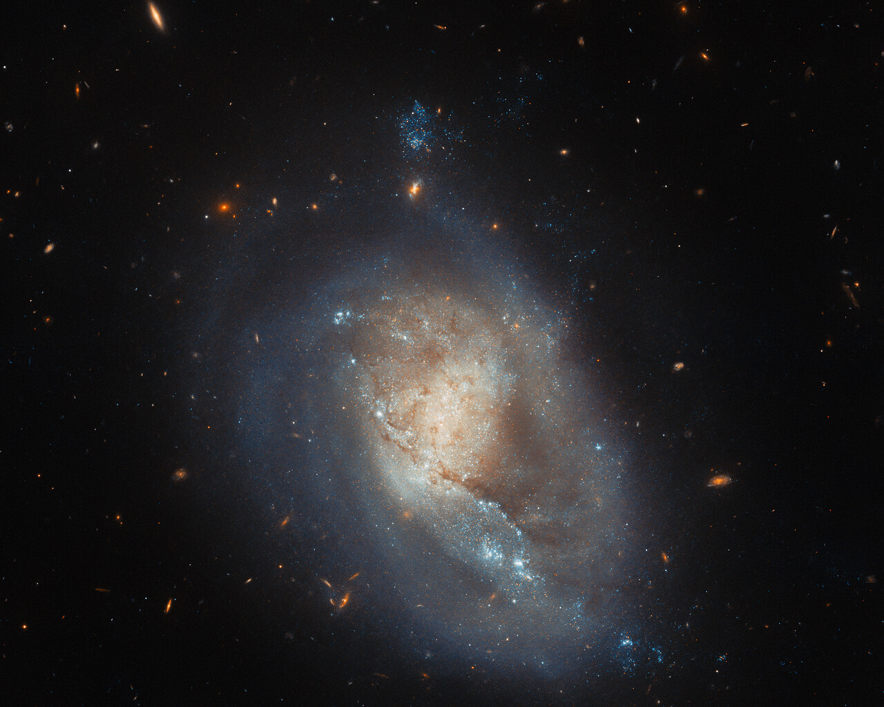 This dwarf galaxy isn't as serene as it might appear in latest Hubble image