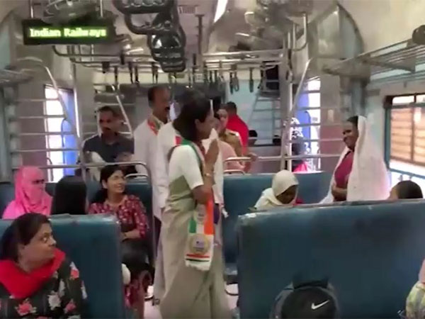 NCP leader Supriya Sule interacts with commuters in train, campaigns for Lok Sabha elections