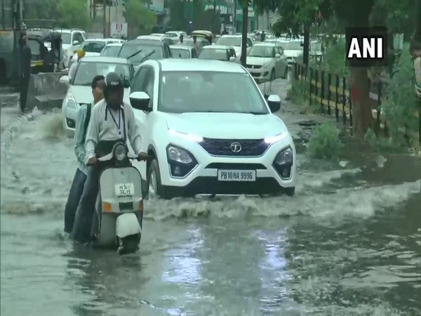 Rains in parts of India, high temperatures in north