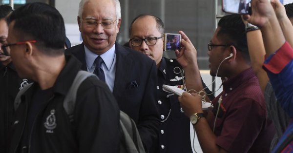Malaysian prosecutors withdraws sedition charges against artist for depicting Najib as 'clown'