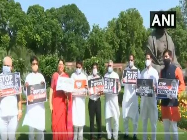 BJP MPs stage protest in Parliament over West Bengal's law, order situation