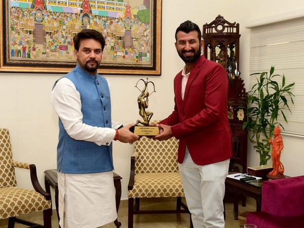 Indian batter Cheteshwar Pujara gets Arjuna Award trophy from Anurag Thakur