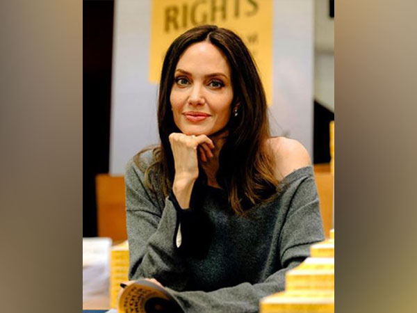 Angelina Jolie Sews Drama into Paris High-Fashion Scene with 'Stitches'