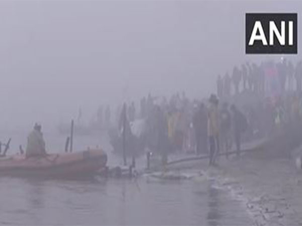 Devotees Brave Chilly Weather to Partake in Maha Kumbh at Triveni Sangam