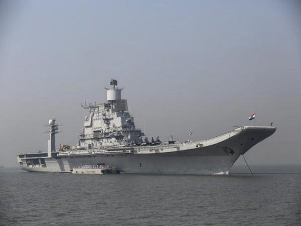 Indian Navy's Sea warriors perform Yoga on aircraft carrier INS Vikramaditya