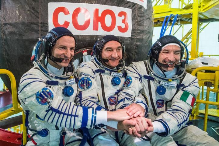 Russian capsule carrying 3 astronauts docks with space station
