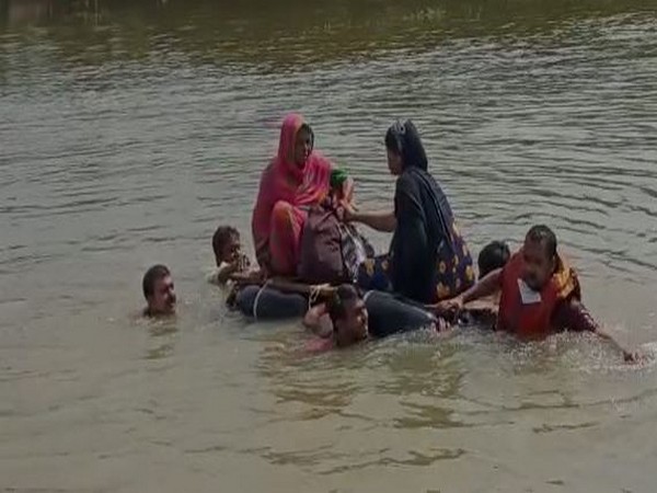 Bihar: Pregnant woman taken to hospital in makeshift boat amid floods in Darbhanga