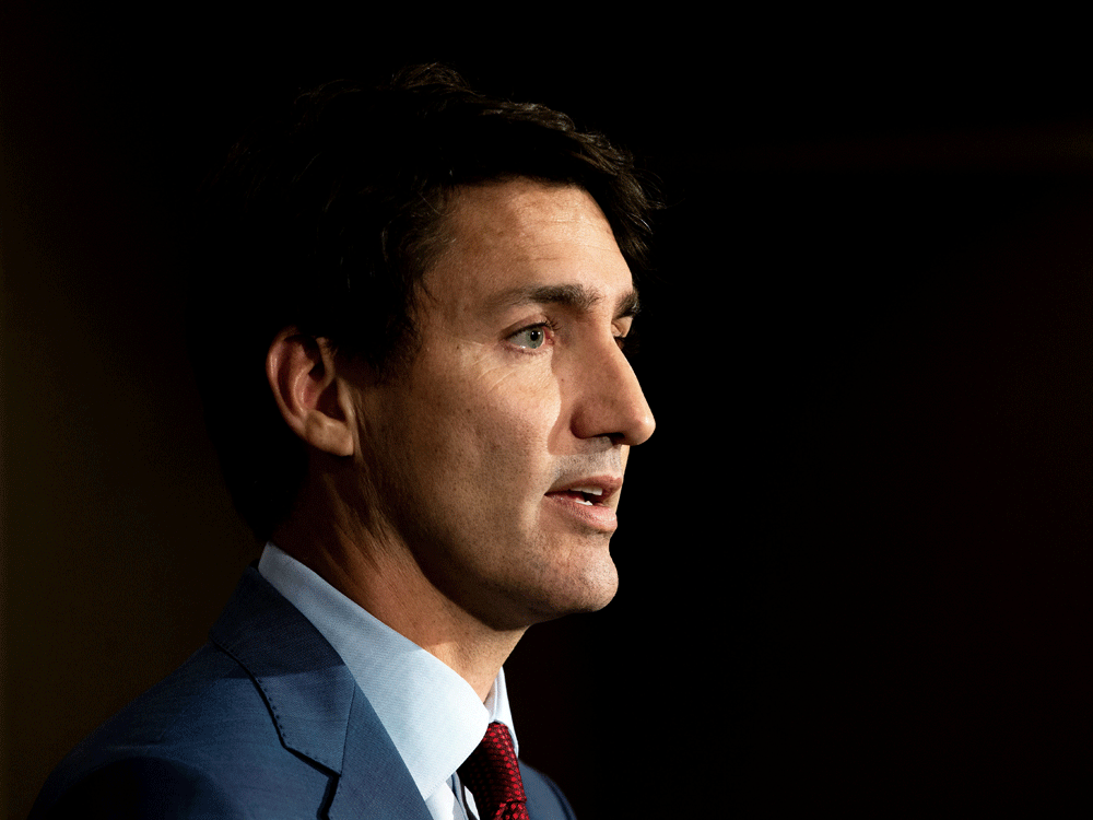 UPDATE 2-Canada's Trudeau cites 'positive momentum' on trade deal as U.S. official visits