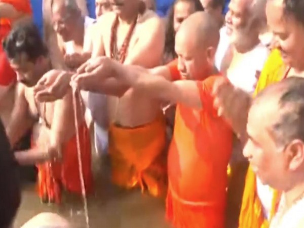 Yogi Adityanath Takes Holy Dip at Maha Kumbh, Unveils Major Development Plans in UP