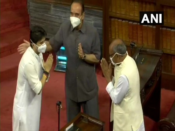 Scindia greets Digvijaya Singh in Rajya Sabha today before oath taking