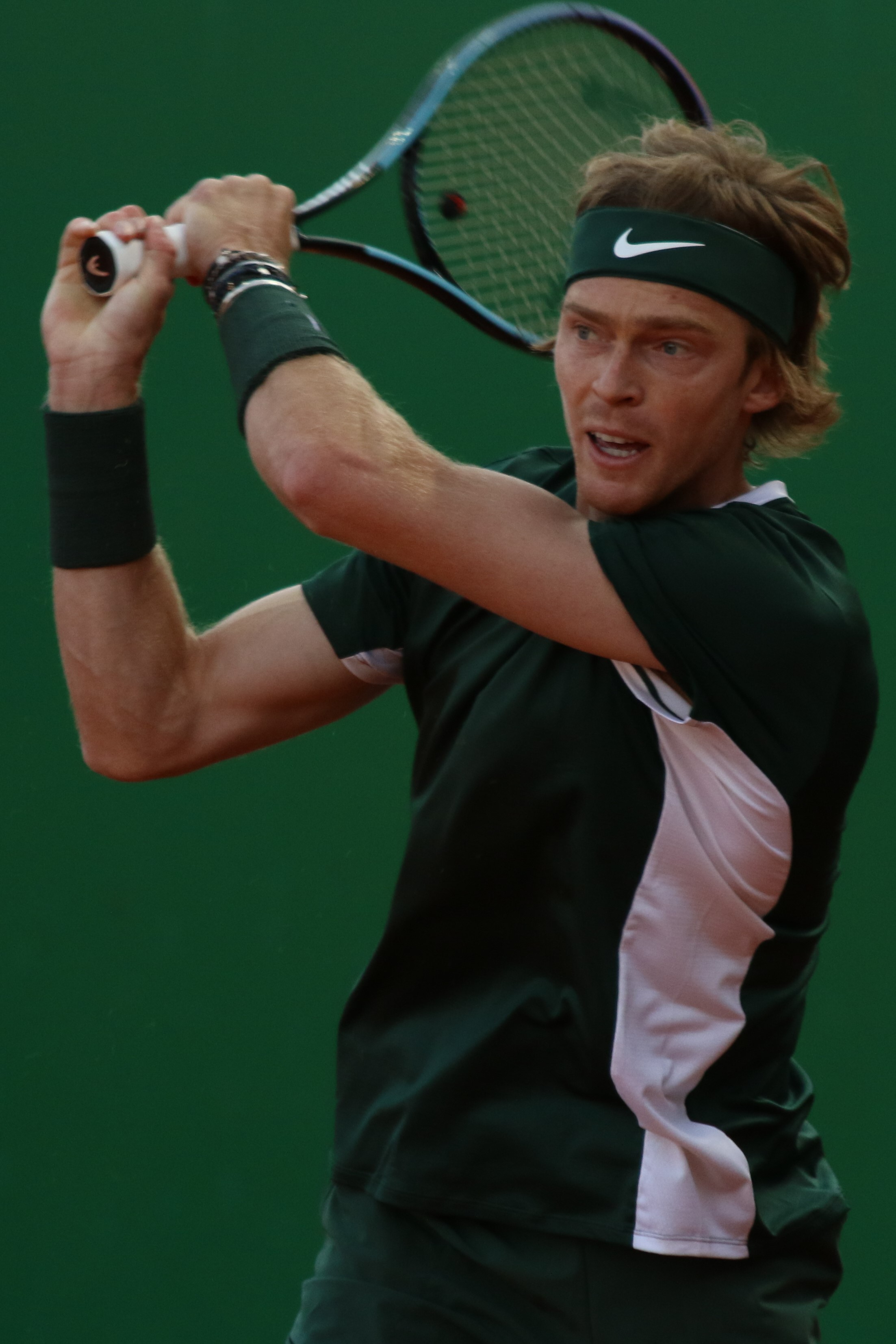 Tennis-Rublev beats wunderkind Rune with lucky net cord on match point 